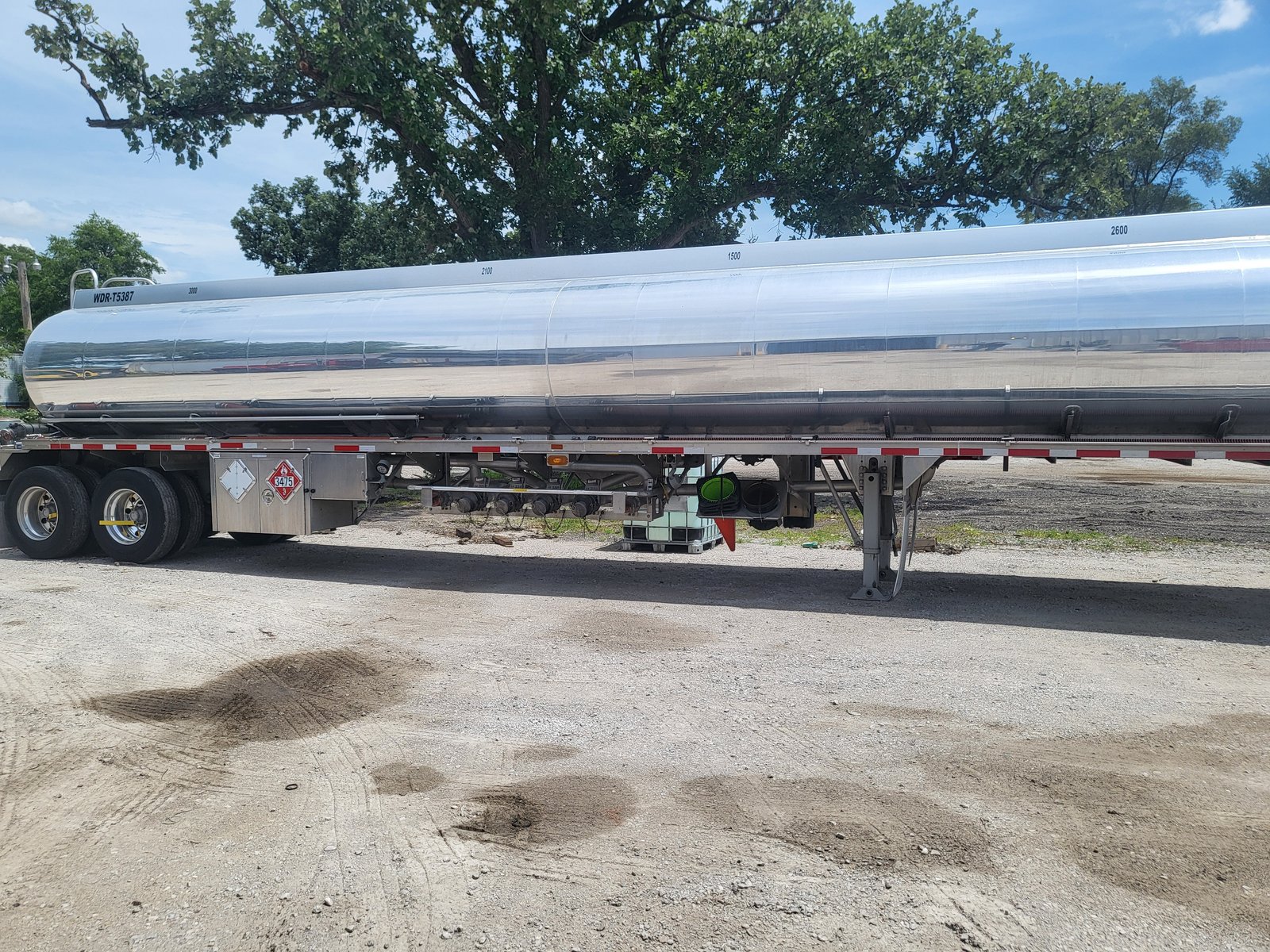 Polished aluminum trailer serviced at Ames Hydraulics in Ames, Iowa