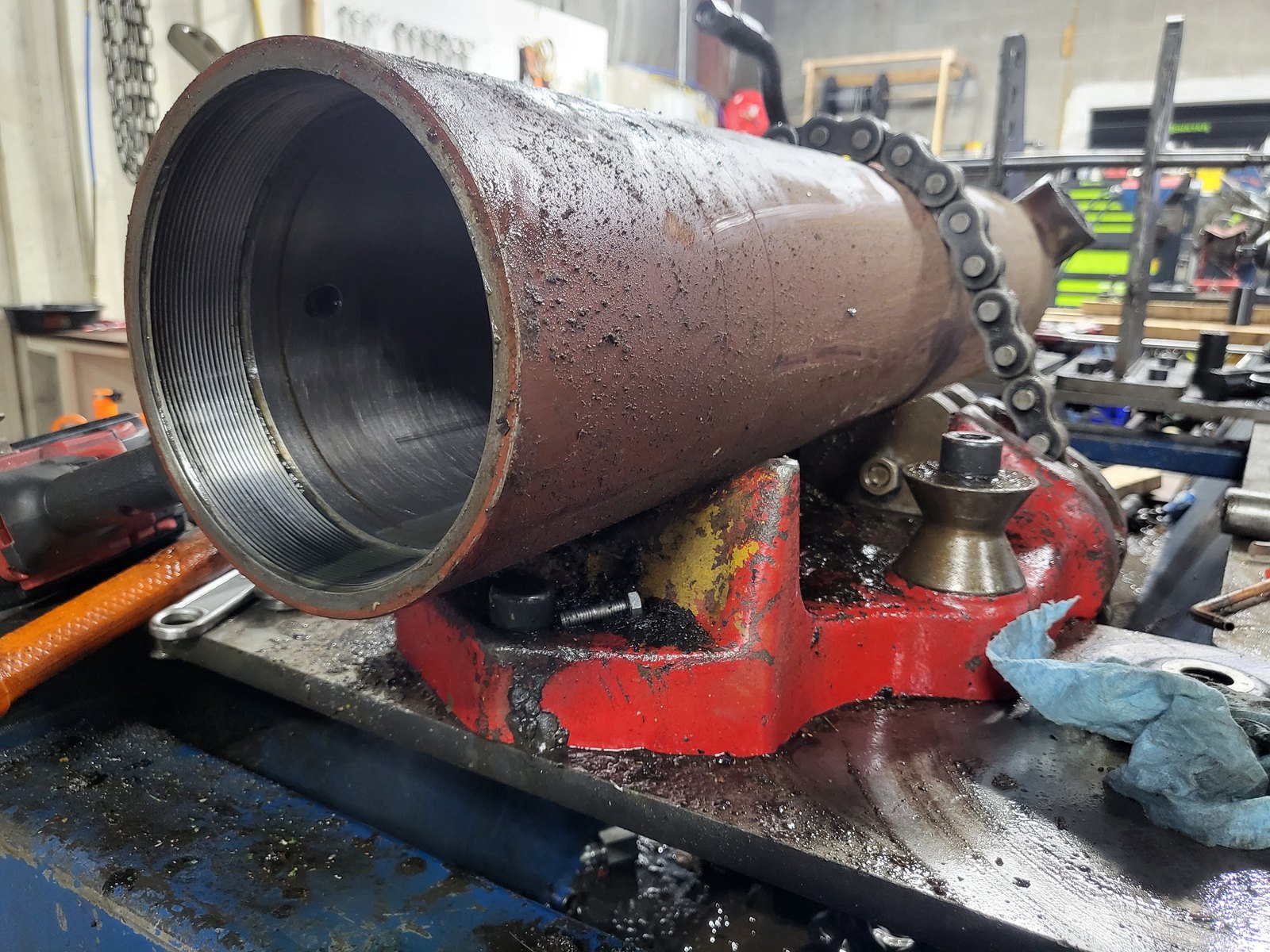 Large hydraulic cylinder on the rebuild bench at Ames Hydraulics in Ames, Iowa