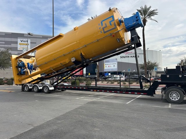 LoPro portable cement silo tilting up for setup, sold and installed by Ames Hydraulics
